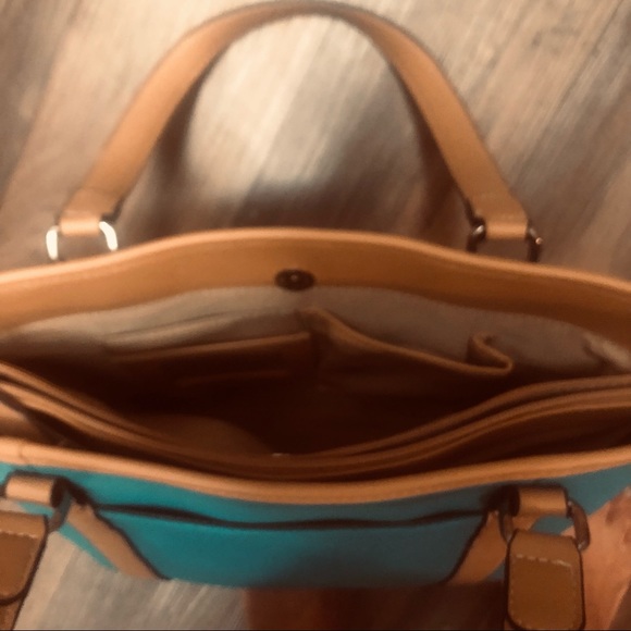 The turquoise bag has tan braided accent.  3 sections to hold your items. - Picture 4 of 5